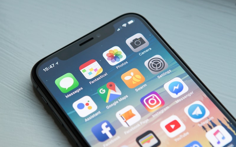 Smartphone in hand — app-based check-in style photo